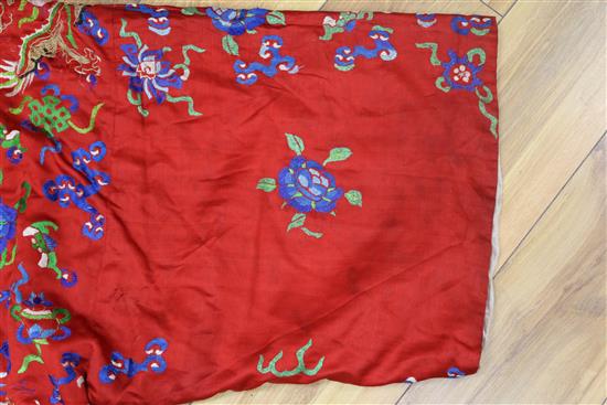 A Chinese embroidered silk dragon robe, early 20th century